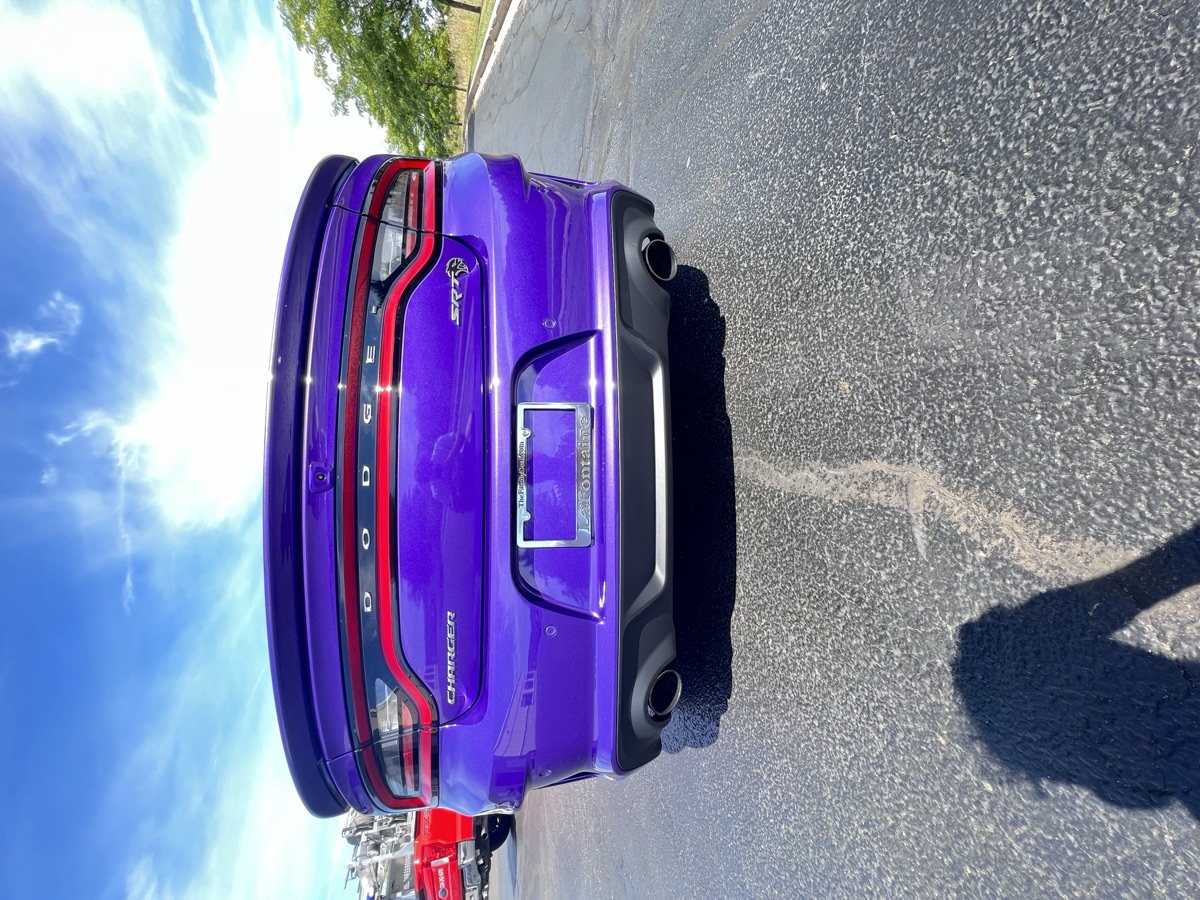 Purple Dodge Charger SRT rear view after detail