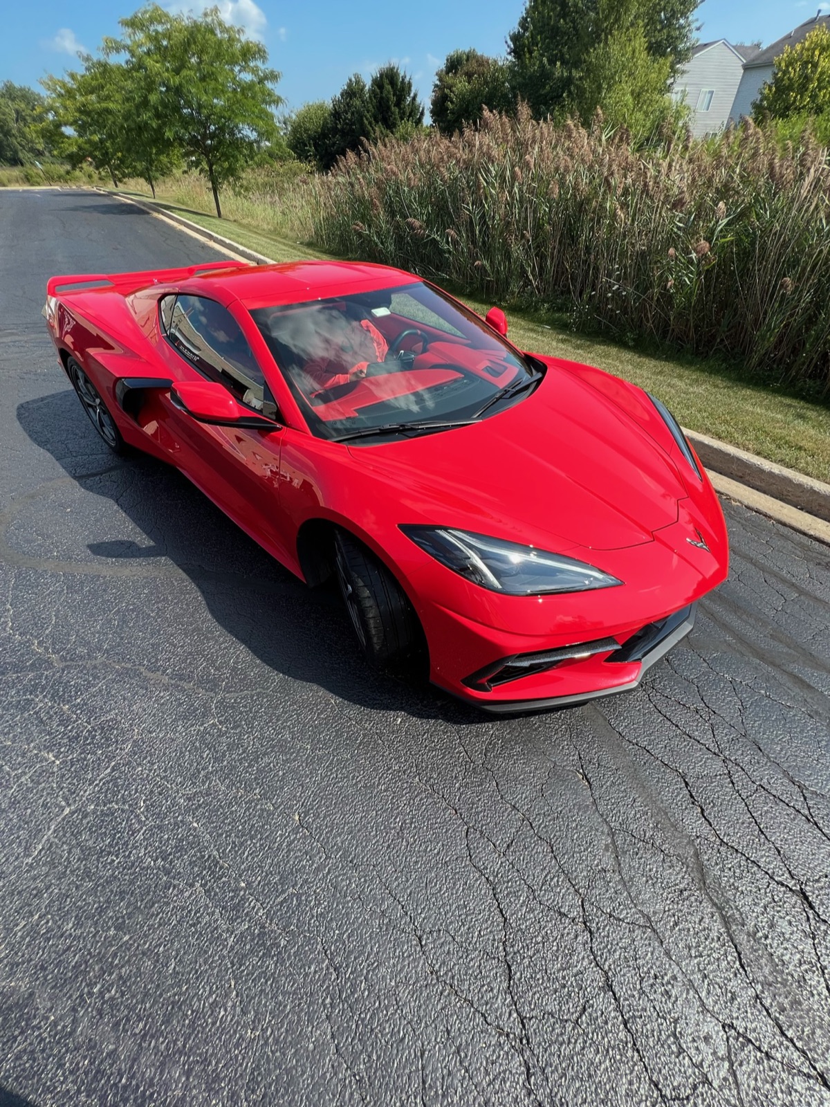 Red C8 Corvette front elevated view after detail