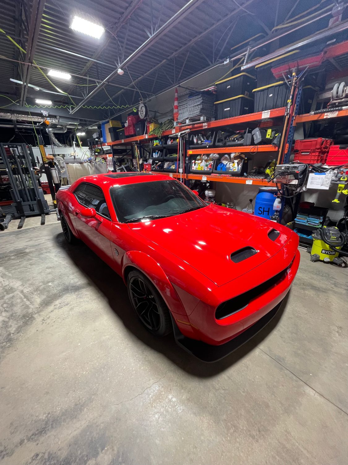 Red Dodge Challenger front view after detail